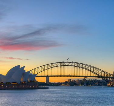 Sydney Opera House and Harbour Bridge at sunset